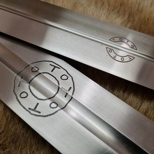 Toto Engraving
